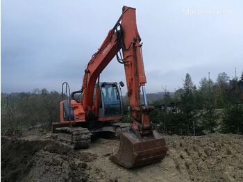 Crawler excavator HITACHI ZX130: picture 1