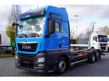 Skip loader truck MAN TGX 26.500