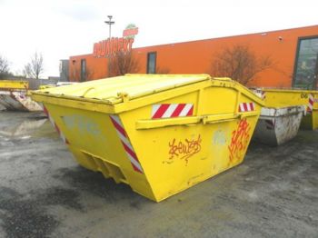 Skip loader truck