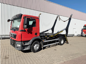 Skip loader truck MAN TGM