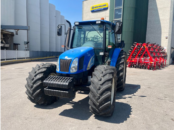 Farm tractor NEW HOLLAND TL100