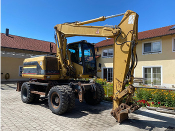 Wheel excavator CATERPILLAR M312