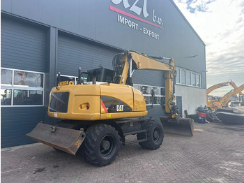 Wheel excavator Caterpillar M313D: picture 4