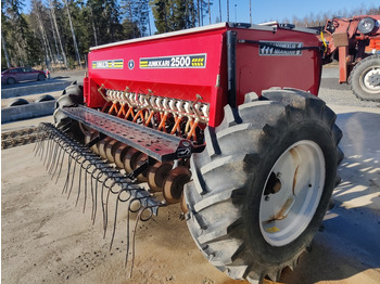 Combine seed drill Simulta Junkkari 250cm kylvölannoitin kiekkovantaat takana: picture 2