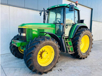 Farm tractor JOHN DEERE 6910