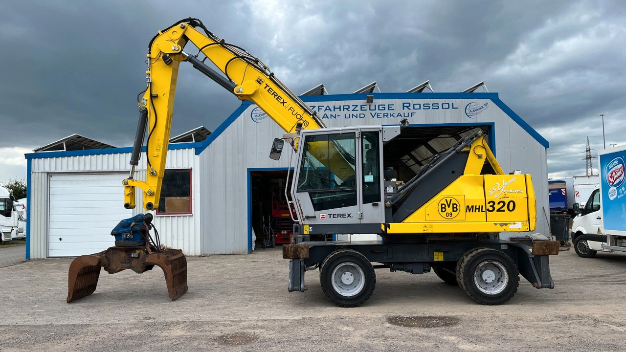 Fuchs TeRex MHL 320 D Umschlagbagger Greifer Pratzen - Waste/ Industry handler: picture 1 Fuchs TeRex MHL 320 D Umschlagbagger Greifer Pratzen - Waste/ Industry handler: picture 1