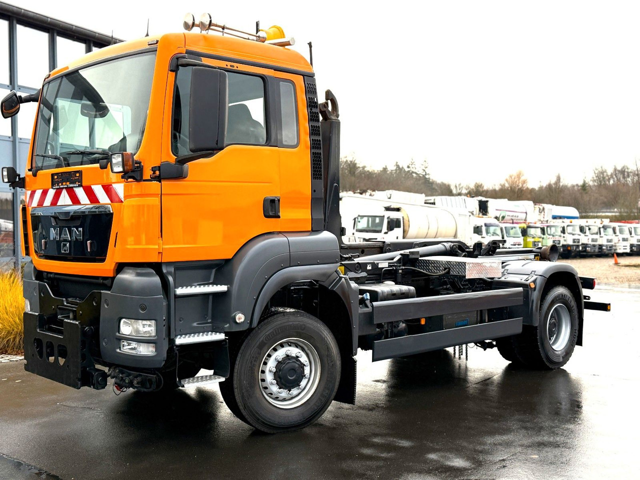 MAN TGS 18.360 4x4 Winterdienst Meiller Abroller - Hook lift truck: picture 1 MAN TGS 18.360 4x4 Winterdienst Meiller Abroller - Hook lift truck: picture 1