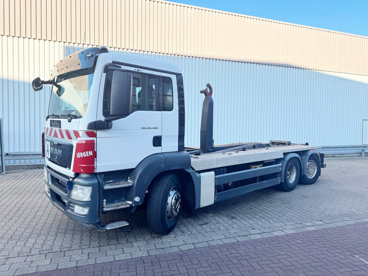 MAN TGS 26.480 6x2-4 BL TGS 26.480 6x2-4 BL, Lenk-Liftachse, VDL Abrollkipper bis 7m Container - Hook lift truck: picture 1 MAN TGS 26.480 6x2-4 BL TGS 26.480 6x2-4 BL, Lenk-Liftachse, VDL Abrollkipper bis 7m Container - Hook lift truck: picture 1