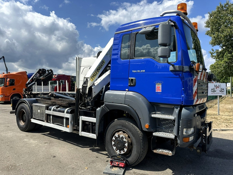 MAN TGA 18.310 4x4 HOOKLIFT + CRANE PALFINGER PK12000 - RADIO - ROTATOR - STEEL SPRING / HUB REDUCTION - MANUAL ZF - BE TRUCK - Hook lift truck, Crane truck: picture 2 MAN TGA 18.310 4x4 HOOKLIFT + CRANE PALFINGER PK12000 - RADIO - ROTATOR - STEEL SPRING / HUB REDUCTION - MANUAL ZF - BE TRUCK - Hook lift truck, Crane truck: picture 2