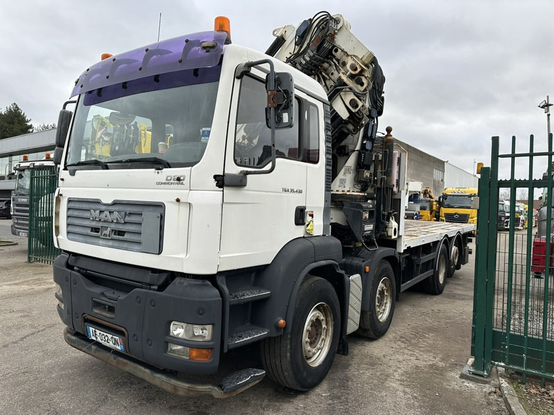 MAN TGA 35.430 8x2 + KRAN HIAB 700 E-6 + JIB 165X-3 - RETARDER - PRITSCHE 6m70~8m50 EXTENDABLE - MANUAL GEARBOX ZF - LIFT + STEERING AXLE - Dropside/ Flatbed truck, Crane truck: picture 2 MAN TGA 35.430 8x2 + KRAN HIAB 700 E-6 + JIB 165X-3 - RETARDER - PRITSCHE 6m70~8m50 EXTENDABLE - MANUAL GEARBOX ZF - LIFT + STEERING AXLE - Dropside/ Flatbed truck, Crane truck: picture 2