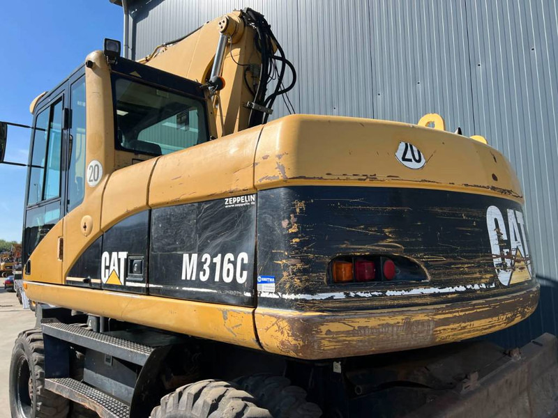Wheel excavator Cat M316C: picture 8