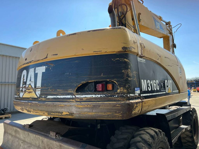 Wheel excavator Cat M316C: picture 10