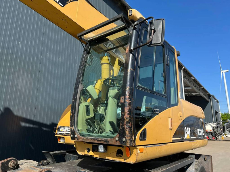 Wheel excavator Cat M316C: picture 11