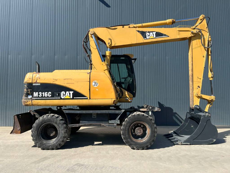 Wheel excavator Cat M316C: picture 6