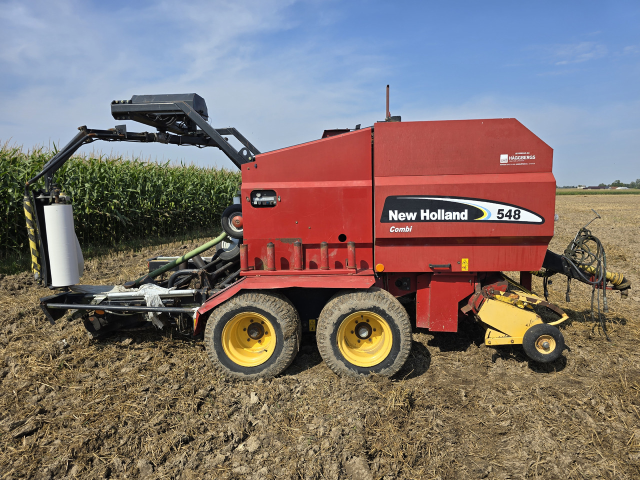 NEW HOLLAND 548 Combi - Round baler: picture 1 NEW HOLLAND 548 Combi - Round baler: picture 1
