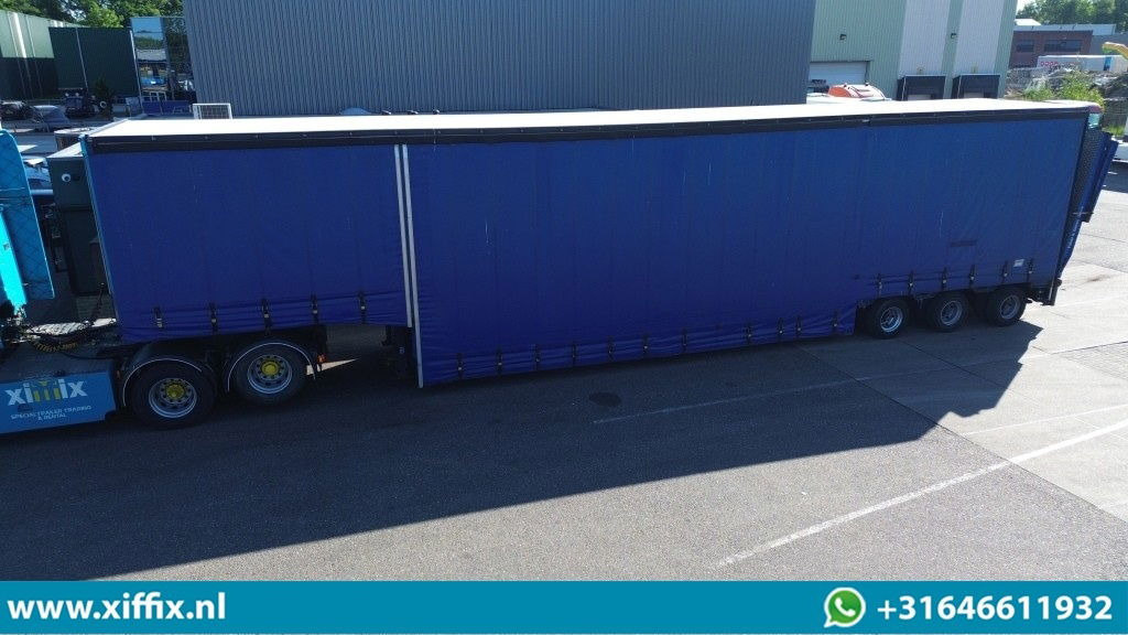 Goldhofer 3-ass. Dieplader met huifopbouw / Hydr. Hefbed en kleppen / 3x gestuur - Low loader semi-trailer: picture 1 Goldhofer 3-ass. Dieplader met huifopbouw / Hydr. Hefbed en kleppen / 3x gestuur - Low loader semi-trailer: picture 1