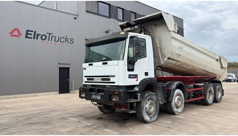 Iveco EUROTRAKKER 320 E 35 (GRAND PONT / LAMES / POMPE MANUELLE / 8X4 / CURSOR 8) - Tipper: picture 1 Iveco EUROTRAKKER 320 E 35 (GRAND PONT / LAMES / POMPE MANUELLE / 8X4 / CURSOR 8) - Tipper: picture 1