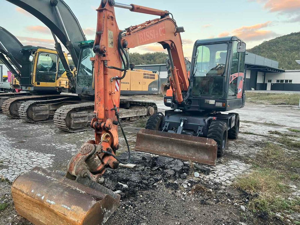 Doosan S55W-V Plus, 4800hours - Wheel excavator: picture 1 Doosan S55W-V Plus, 4800hours - Wheel excavator: picture 1