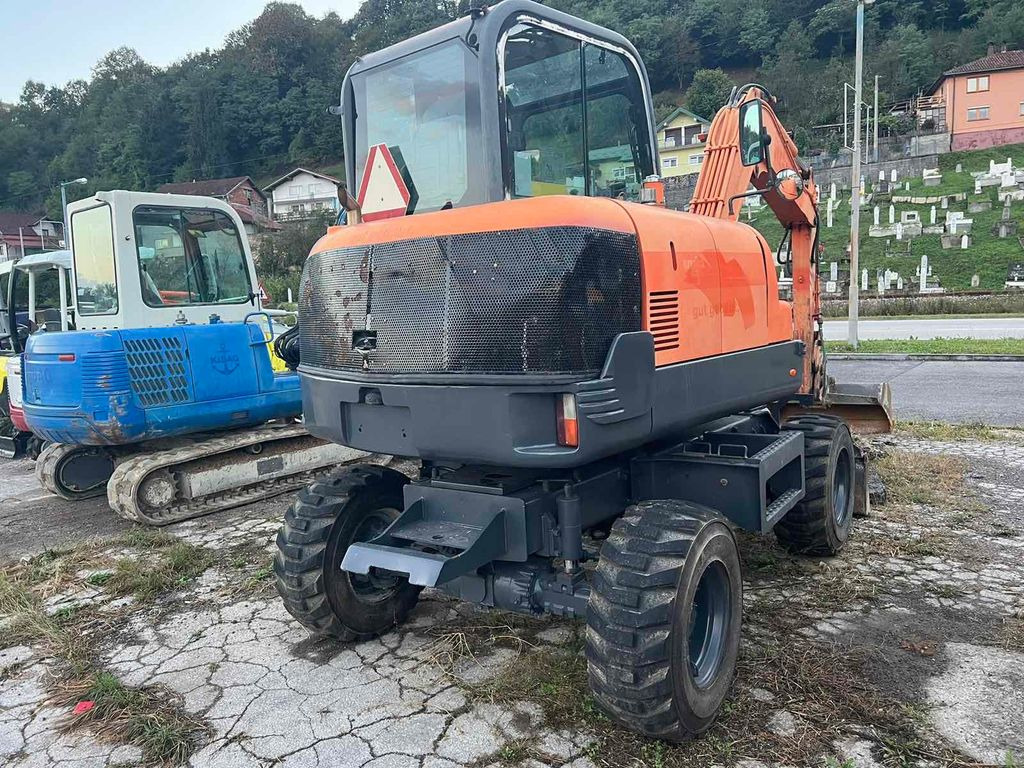 Doosan S55W-V Plus, 4800hours - Wheel excavator: picture 4 Doosan S55W-V Plus, 4800hours - Wheel excavator: picture 4