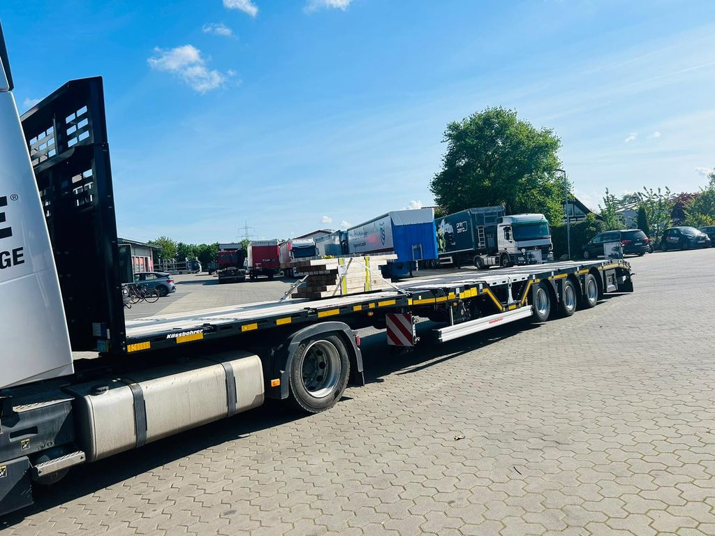 Kässbohrer Mega Tele HD Plattform Auflieger mit Radmulden - Dropside/ Flatbed semi-trailer: picture 1 Kässbohrer Mega Tele HD Plattform Auflieger mit Radmulden - Dropside/ Flatbed semi-trailer: picture 1