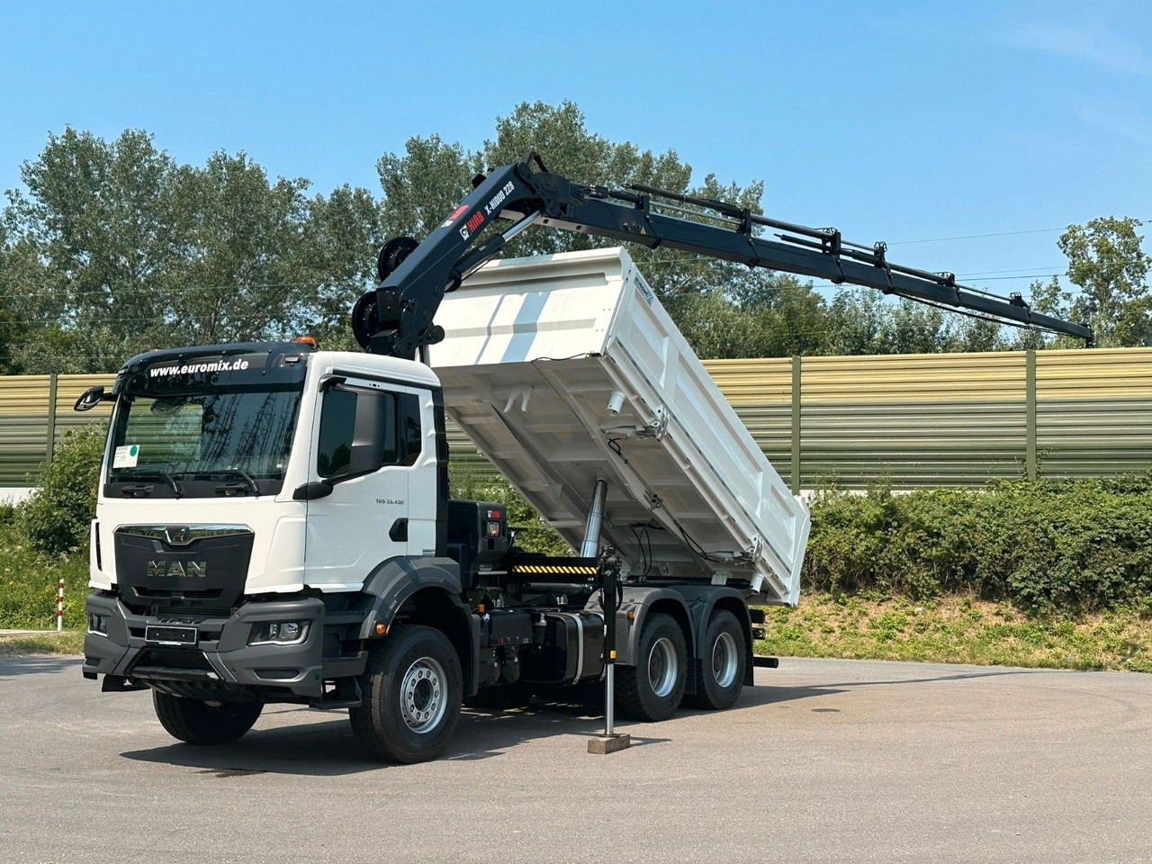 MAN TGS 33.440 6x4 /3-Seiten- Kipper / HIAB 228-6 - Tipper, Crane truck: picture 1 MAN TGS 33.440 6x4 /3-Seiten- Kipper / HIAB 228-6 - Tipper, Crane truck: picture 1