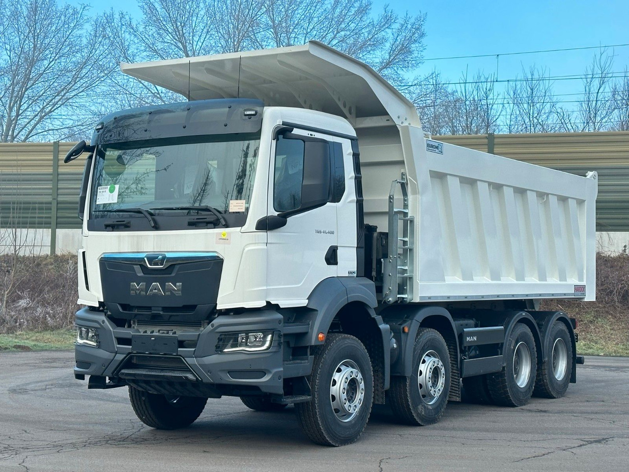 MAN TGS 41.400 8x4 / EUROMIX MTP 23m³/ Eckige Mulde MAN TGS 41.400 8x4 / EUROMIX MTP 23m³/ Eckige Mulde - Tipper: picture 1 MAN TGS 41.400 8x4 / EUROMIX MTP 23m³/ Eckige Mulde MAN TGS 41.400 8x4 / EUROMIX MTP 23m³/ Eckige Mulde - Tipper: picture 1