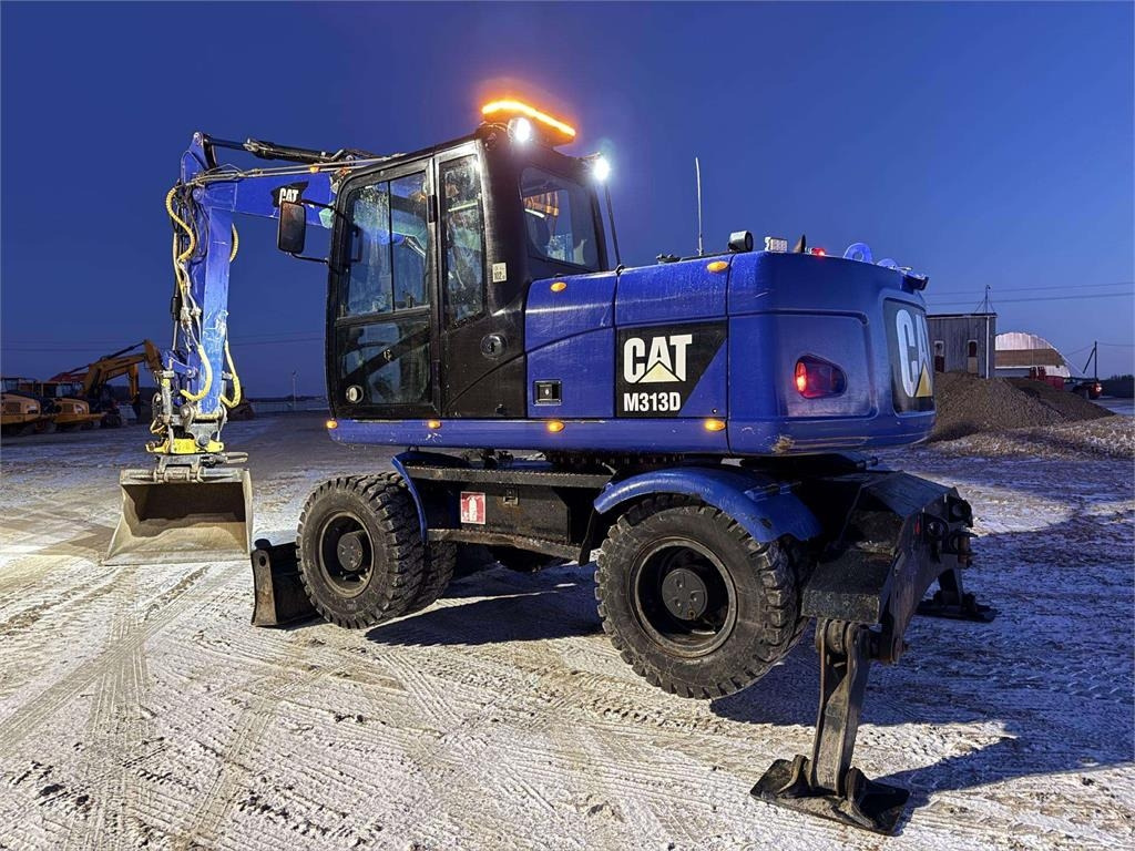 CAT M 313 D Rototilt + Grapple - Wheel excavator: picture 2 CAT M 313 D Rototilt + Grapple - Wheel excavator: picture 2