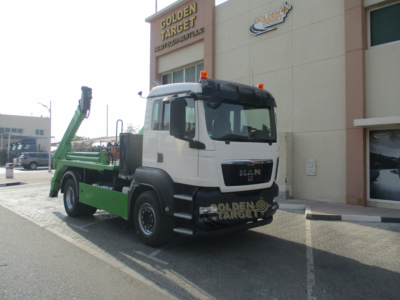 MAN TGS 18.440 - Skip loader truck: picture 1 MAN TGS 18.440 - Skip loader truck: picture 1