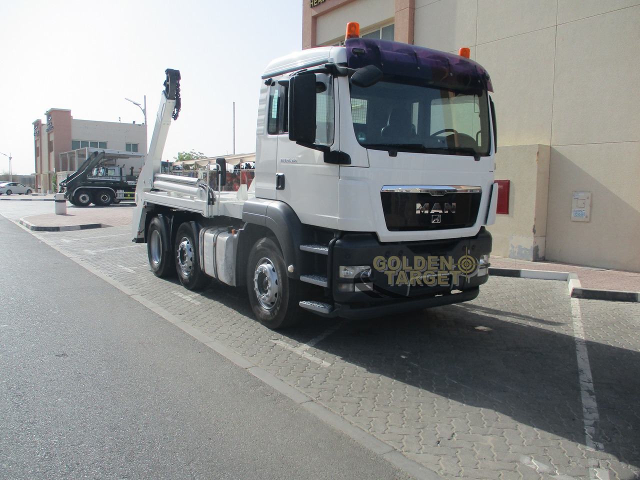 MAN TGS 26.360 6x2 Skip Loader - Skip loader truck: picture 1 MAN TGS 26.360 6x2 Skip Loader - Skip loader truck: picture 1