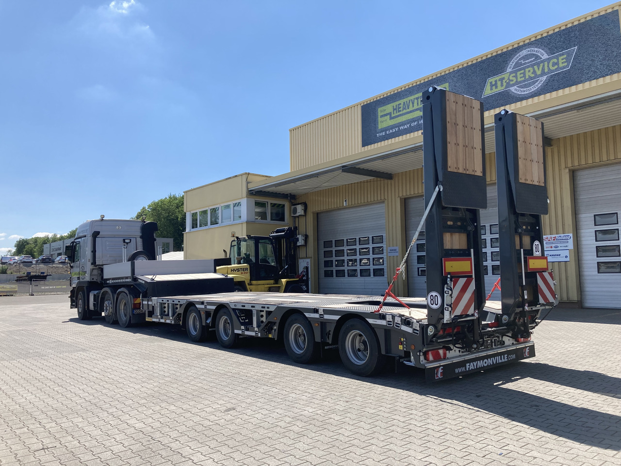 FAYMONVILLE 4(2+2)-Achs-Tele-Semi mit Radmulden und Rampen - Low loader semi-trailer: picture 1 FAYMONVILLE 4(2+2)-Achs-Tele-Semi mit Radmulden und Rampen - Low loader semi-trailer: picture 1