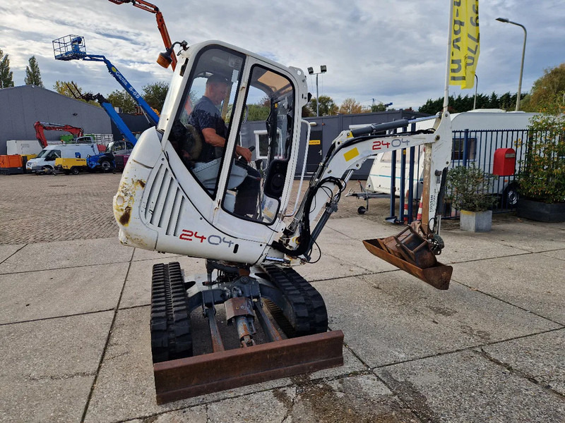 WACKER NEUSON 2404RD, kan op een berghelling draaien - Mini excavator: picture 1 WACKER NEUSON 2404RD, kan op een berghelling draaien - Mini excavator: picture 1