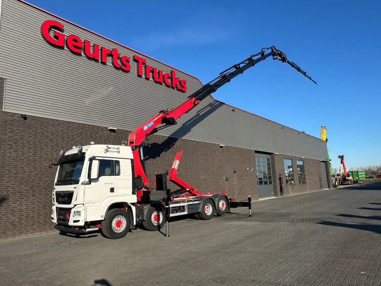 MAN TGS 35.510 8X4H-6BL HMF5020 RCS K6 + FLY-JIB FJ1 - Hook lift truck, Crane truck: picture 2 MAN TGS 35.510 8X4H-6BL HMF5020 RCS K6 + FLY-JIB FJ1 - Hook lift truck, Crane truck: picture 2