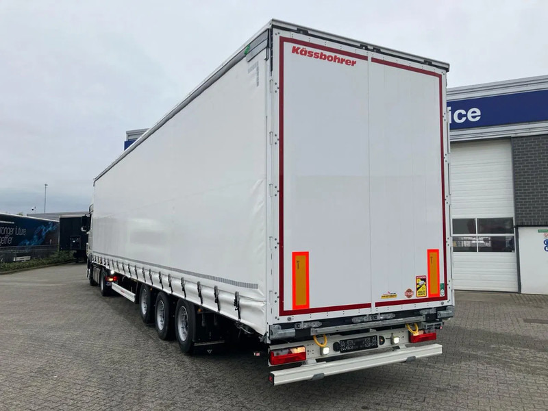 Kässbohrer SCS M / 90 - 12 / 27 MEGA Schuifzeilen met hefdak en 2 liftassen - Curtainsider semi-trailer: picture 4 Kässbohrer SCS M / 90 - 12 / 27 MEGA Schuifzeilen met hefdak en 2 liftassen - Curtainsider semi-trailer: picture 4
