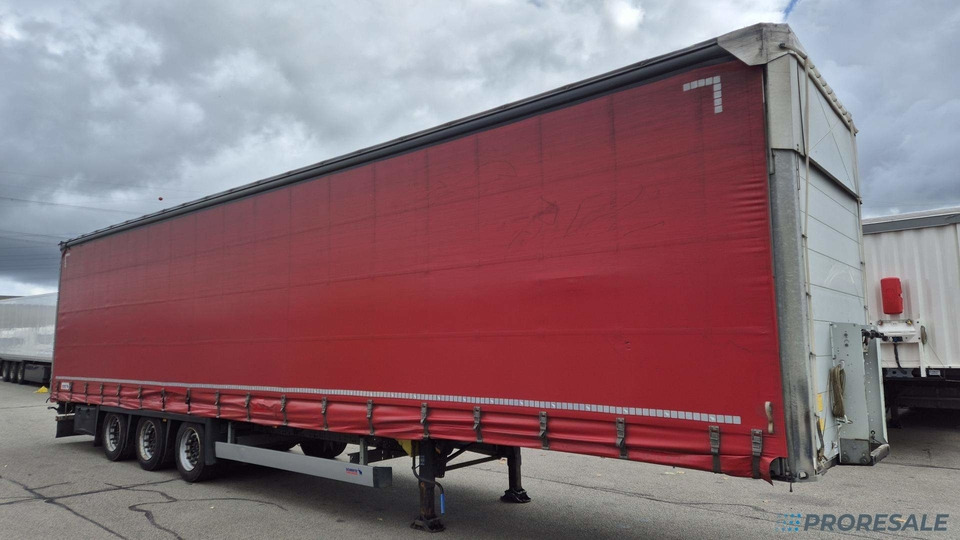 SCHMITZ CARGOBULL SCB S3T MEGA - Curtainsider semi-trailer: picture 1 SCHMITZ CARGOBULL SCB S3T MEGA - Curtainsider semi-trailer: picture 1