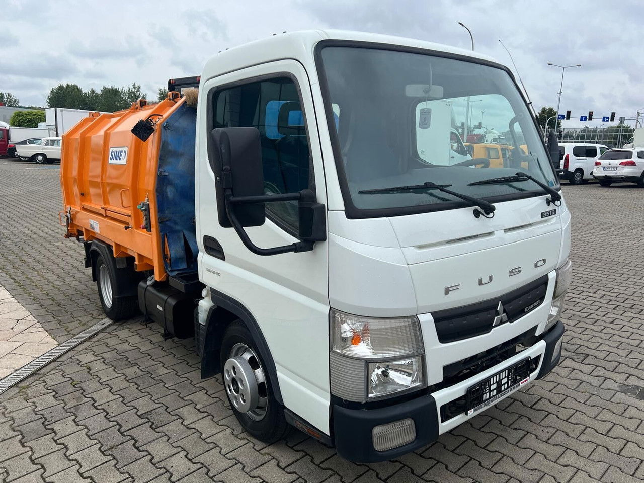 Mitsubishi Canter Fuso 3S13 AMT / Presscontainer / LOW KM / Super Condition - Garbage truck: picture 2 Mitsubishi Canter Fuso 3S13 AMT / Presscontainer / LOW KM / Super Condition - Garbage truck: picture 2