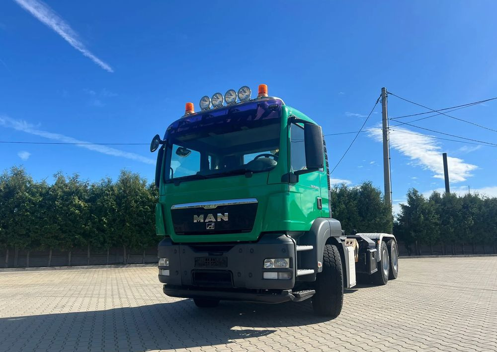 MAN TGS 26.440 | Hakowiec Meiller| 6x4 | 440 KM | przód resor, tył pneumatyczne |Belka ostrzegawcza (koguty) - Hook lift truck: picture 1 MAN TGS 26.440 | Hakowiec Meiller| 6x4 | 440 KM | przód resor, tył pneumatyczne |Belka ostrzegawcza (koguty) - Hook lift truck: picture 1
