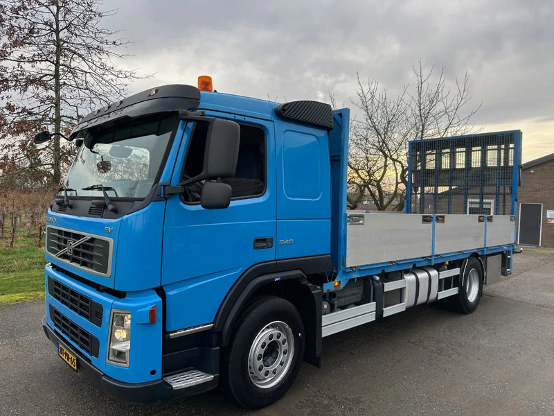 Volvo FM 340 / NL TRUCK / 4X2 / EURO5 / MACHINE TRANSPORT / HYDR. RAMP / WINCH - Autotransporter truck: picture 1 Volvo FM 340 / NL TRUCK / 4X2 / EURO5 / MACHINE TRANSPORT / HYDR. RAMP / WINCH - Autotransporter truck: picture 1