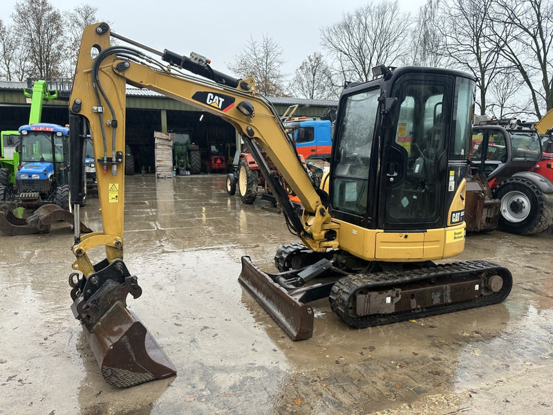 Caterpillar 303.5E CR All functions 3 buckets - Mini excavator: picture 1 Caterpillar 303.5E CR All functions 3 buckets - Mini excavator: picture 1