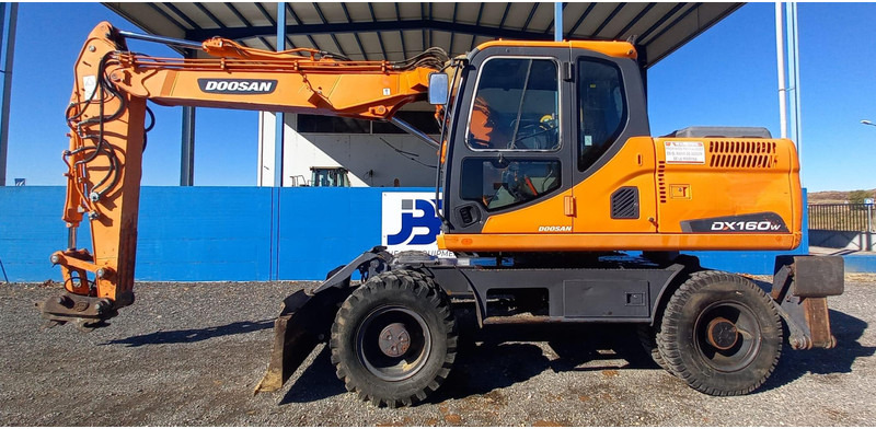 Doosan DX140W-3 - Wheel excavator: picture 1 Doosan DX140W-3 - Wheel excavator: picture 1