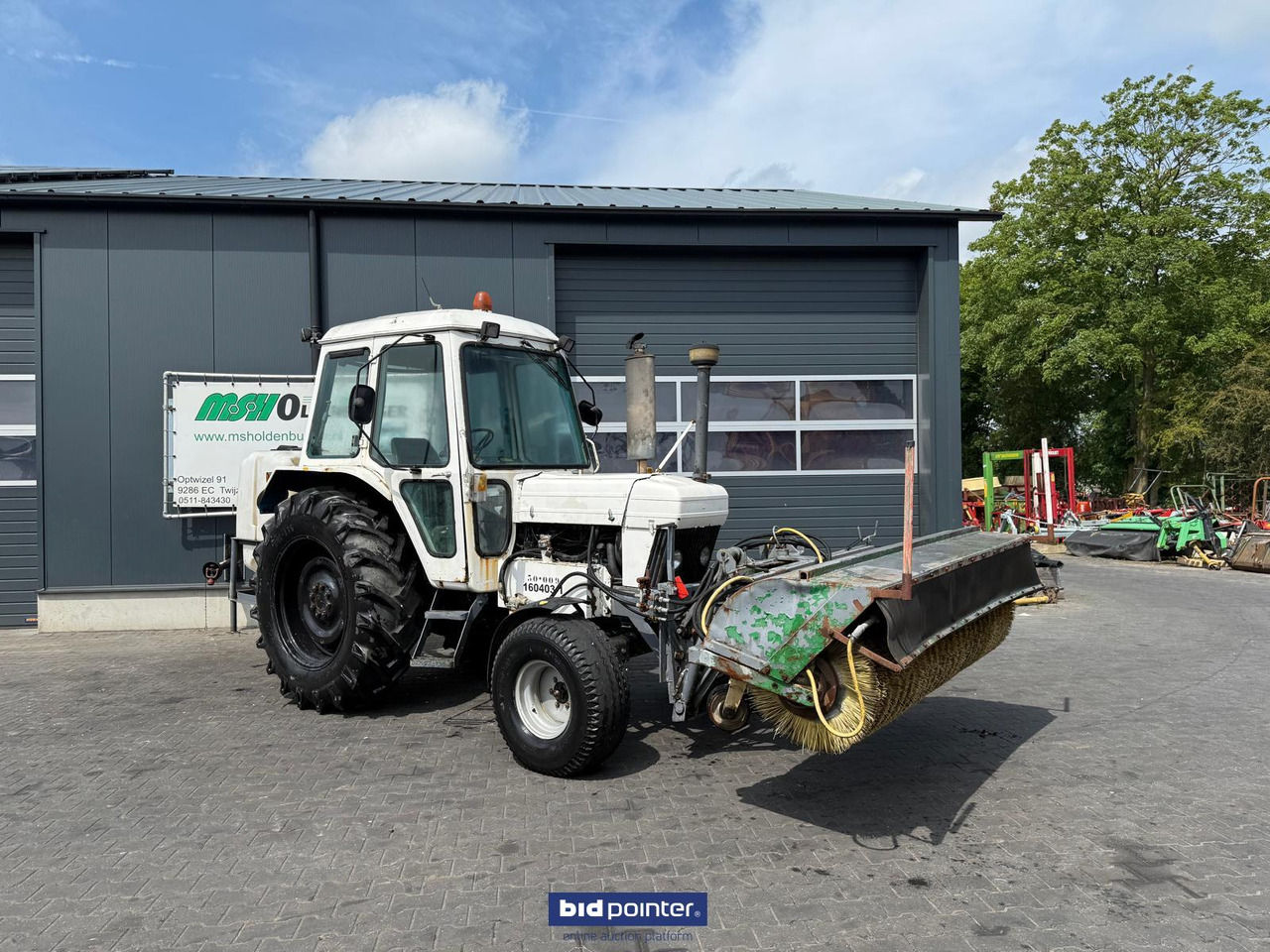 Ford 6610 met rolbezem - Farm tractor: picture 1 Ford 6610 met rolbezem - Farm tractor: picture 1