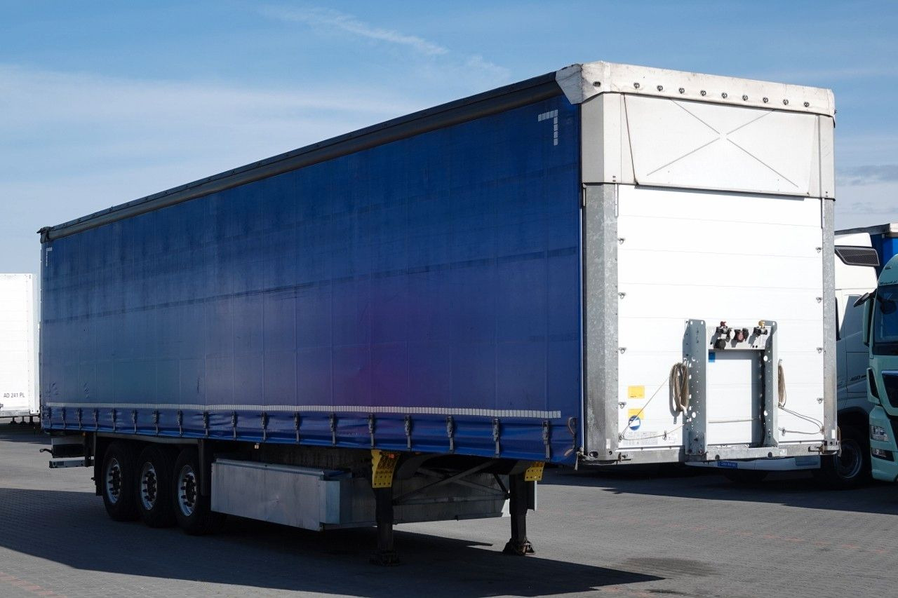 Schmitz Cargobull FIRANKA / STANDARD / DACH PODNOSZONY / OŚ PODNO - Curtainsider semi-trailer: picture 4 Schmitz Cargobull FIRANKA / STANDARD / DACH PODNOSZONY / OŚ PODNO - Curtainsider semi-trailer: picture 4