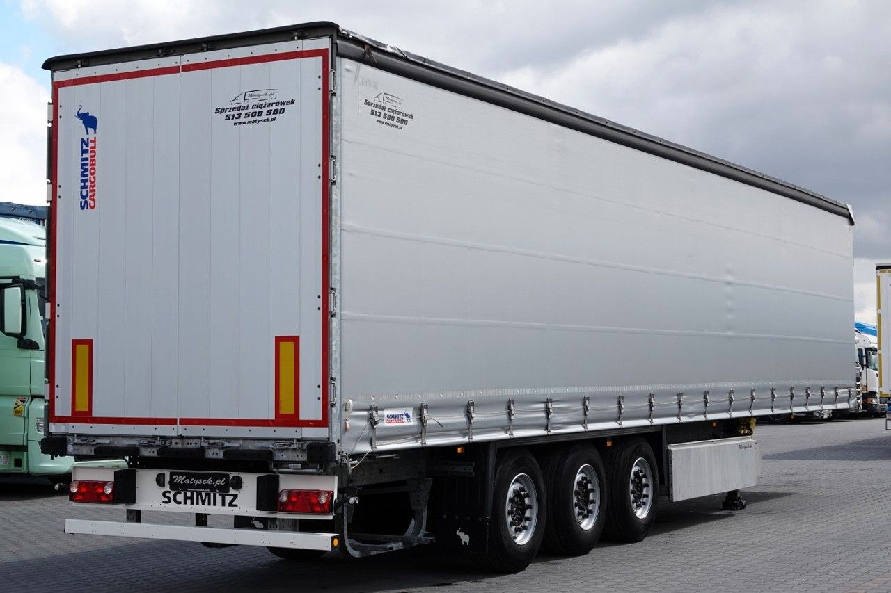 Schmitz Cargobull FIRANKA / STANDARD / OŚ PODNOSZONA / KOSZ NA PAL - Curtainsider semi-trailer: picture 4 Schmitz Cargobull FIRANKA / STANDARD / OŚ PODNOSZONA / KOSZ NA PAL - Curtainsider semi-trailer: picture 4