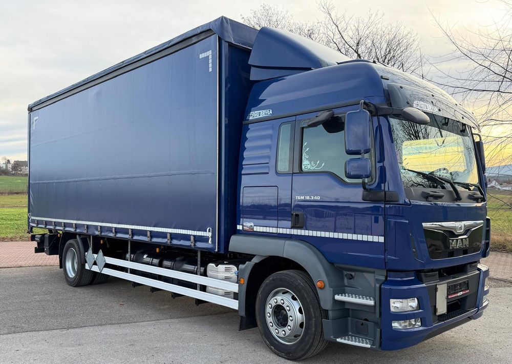MAN TGM 18.340 / FIRANKA / SPROWADZONY / 9100 ŁADOWNOŚĆ / 18 PALET / E6 / WINDA / - Curtainsider truck: picture 1 MAN TGM 18.340 / FIRANKA / SPROWADZONY / 9100 ŁADOWNOŚĆ / 18 PALET / E6 / WINDA / - Curtainsider truck: picture 1