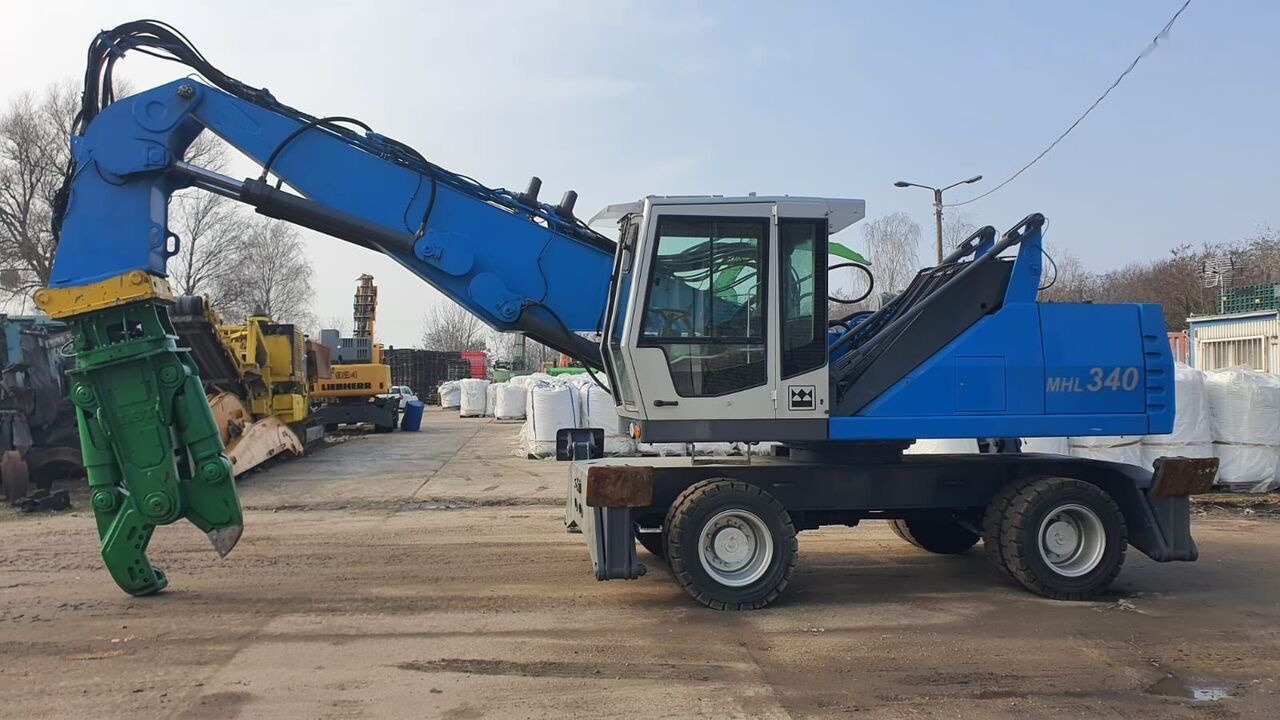 Fuchs MHL 340D FQC + LST 3to shear - Waste/ Industry handler: picture 1 Fuchs MHL 340D FQC + LST 3to shear - Waste/ Industry handler: picture 1