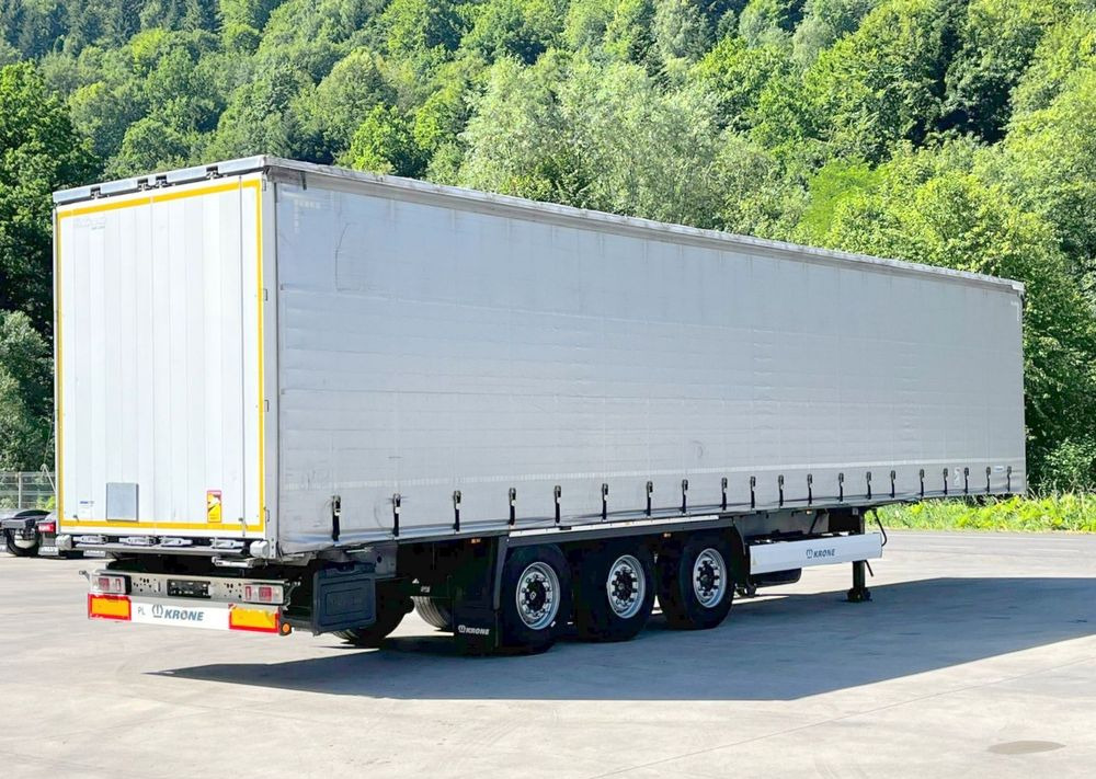 Krone Firanka Coilmulde // 9m // Alu Drzwi // Ażury // Oś podnoszona // - Curtainsider semi-trailer: picture 1 Krone Firanka Coilmulde // 9m // Alu Drzwi // Ażury // Oś podnoszona // - Curtainsider semi-trailer: picture 1
