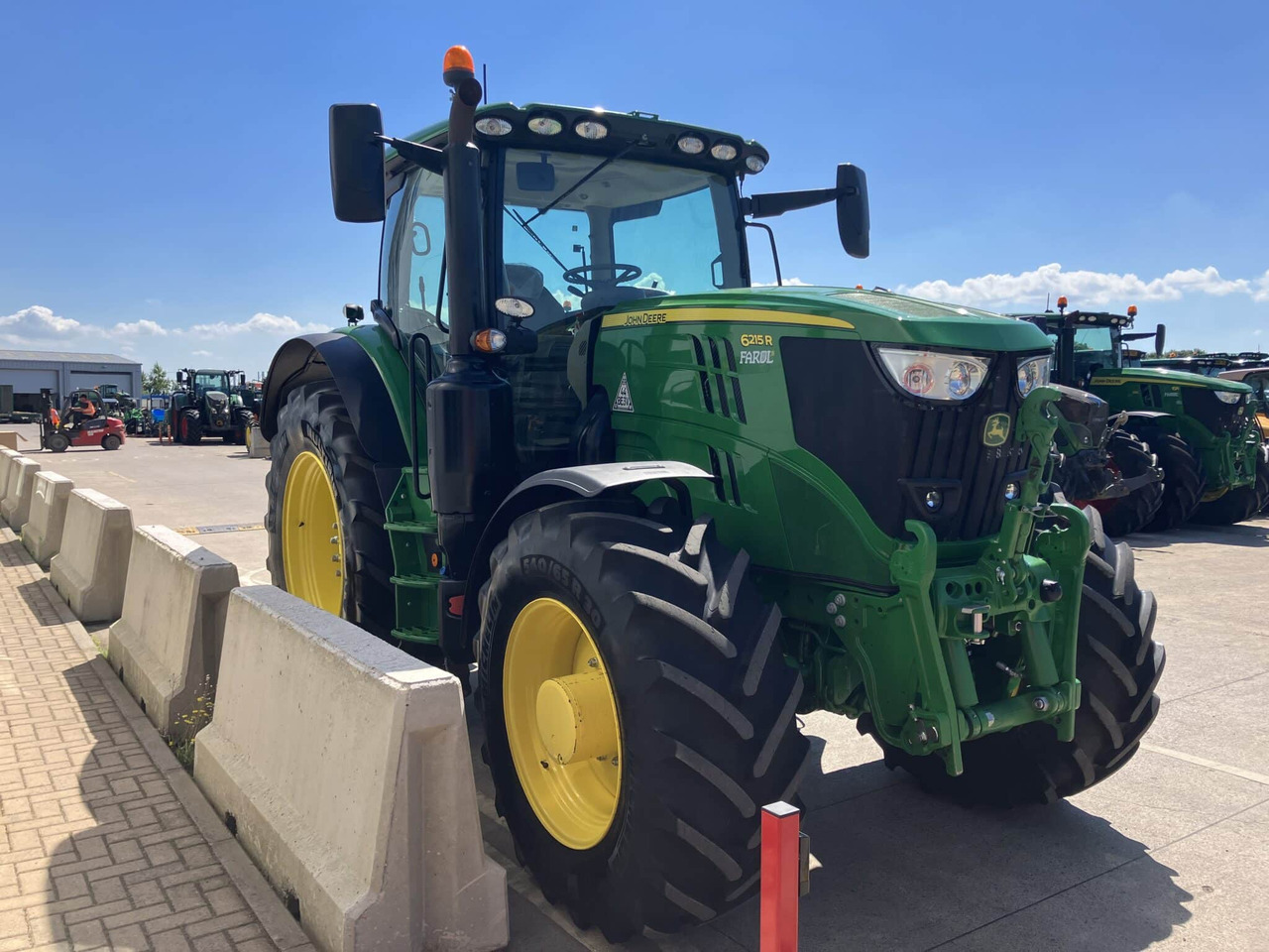 Farm tractor John Deere 6215R: picture 6
