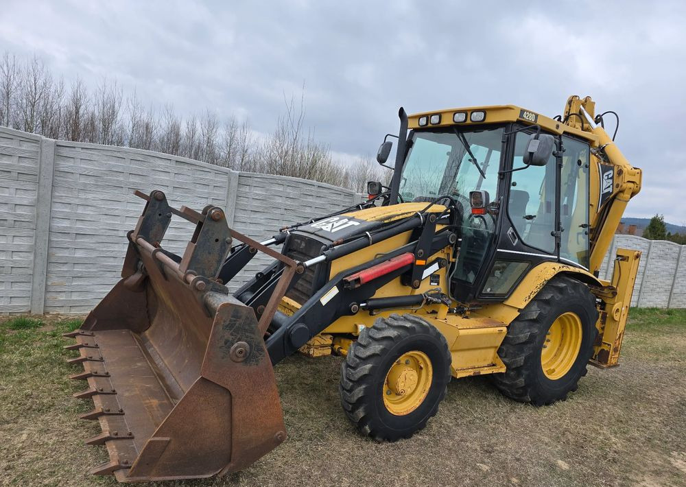 Backhoe loader Caterpillar: picture 1