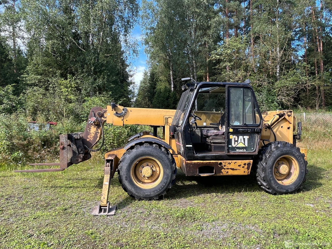 Caterpillar TH63, kurottaja piikeillä ja kauhalla, 2002, Loppi - Agricultural machinery: picture 1 Caterpillar TH63, kurottaja piikeillä ja kauhalla, 2002, Loppi - Agricultural machinery: picture 1