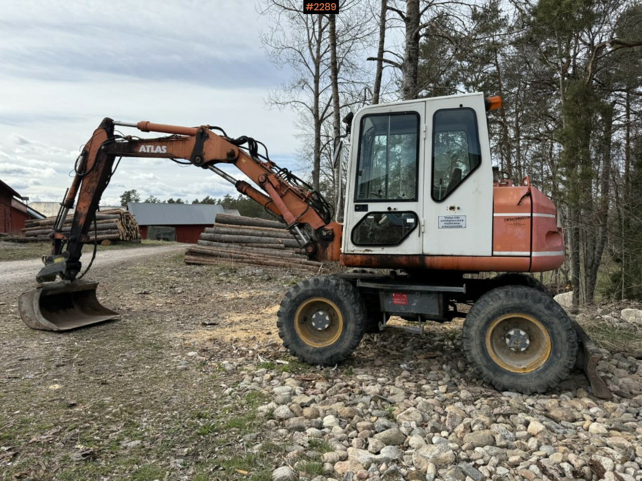 Wheeled excavator Atlas 1004 with attachments - Wheel excavator: picture 1 Wheeled excavator Atlas 1004 with attachments - Wheel excavator: picture 1