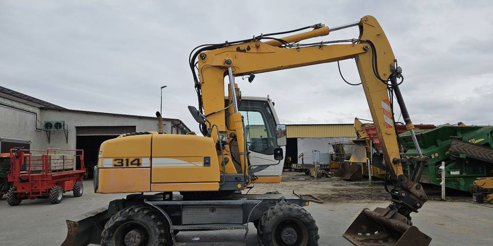 Koparka kołowa Liebherr A314 Litronic 9350 h+ 5 łyżek kołówka - Wheel excavator: picture 5 Koparka kołowa Liebherr A314 Litronic 9350 h+ 5 łyżek kołówka - Wheel excavator: picture 5